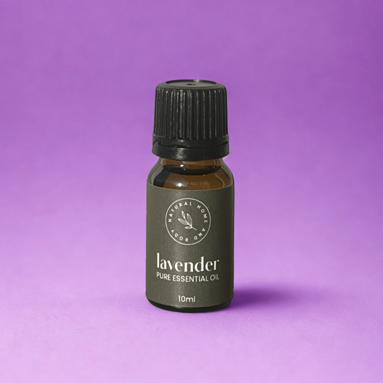 Lavender pure essential oil bottle on a purple background